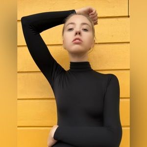 Black turtleneck bodysuit